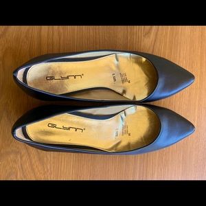 Pair of women’s black flats, size 8,
